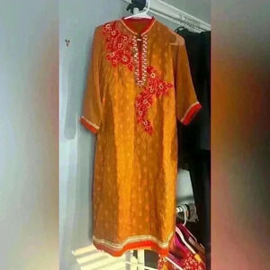 Kurti/Anarkali red/orange embroidery with exquisite detail